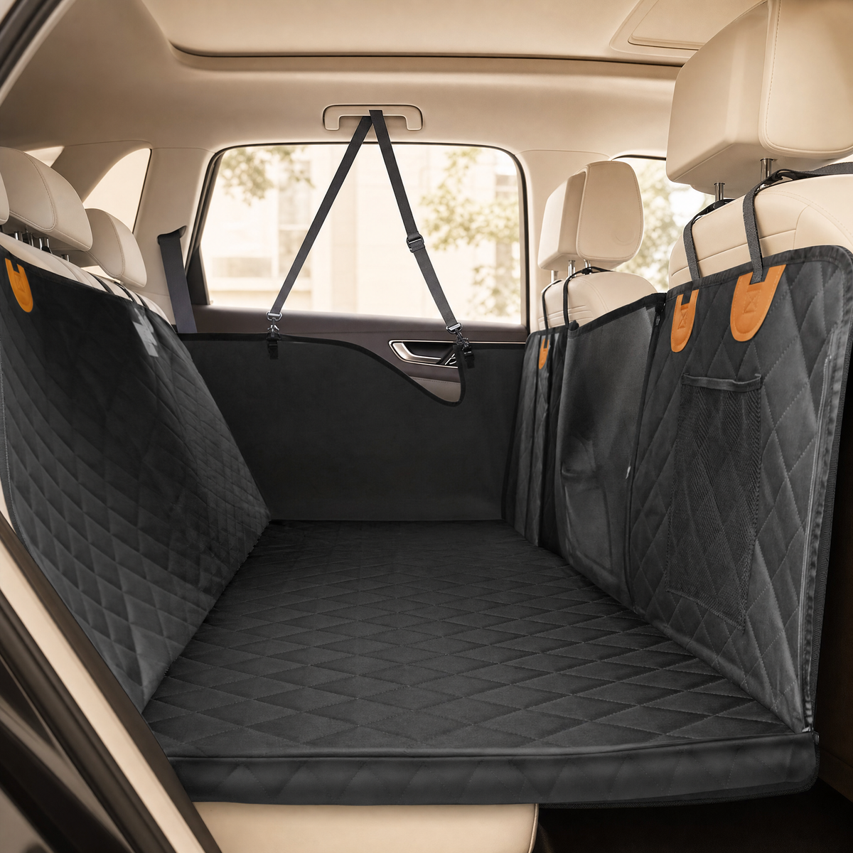 Waterproof dog car seat cover back seat extender installed across a car back seat