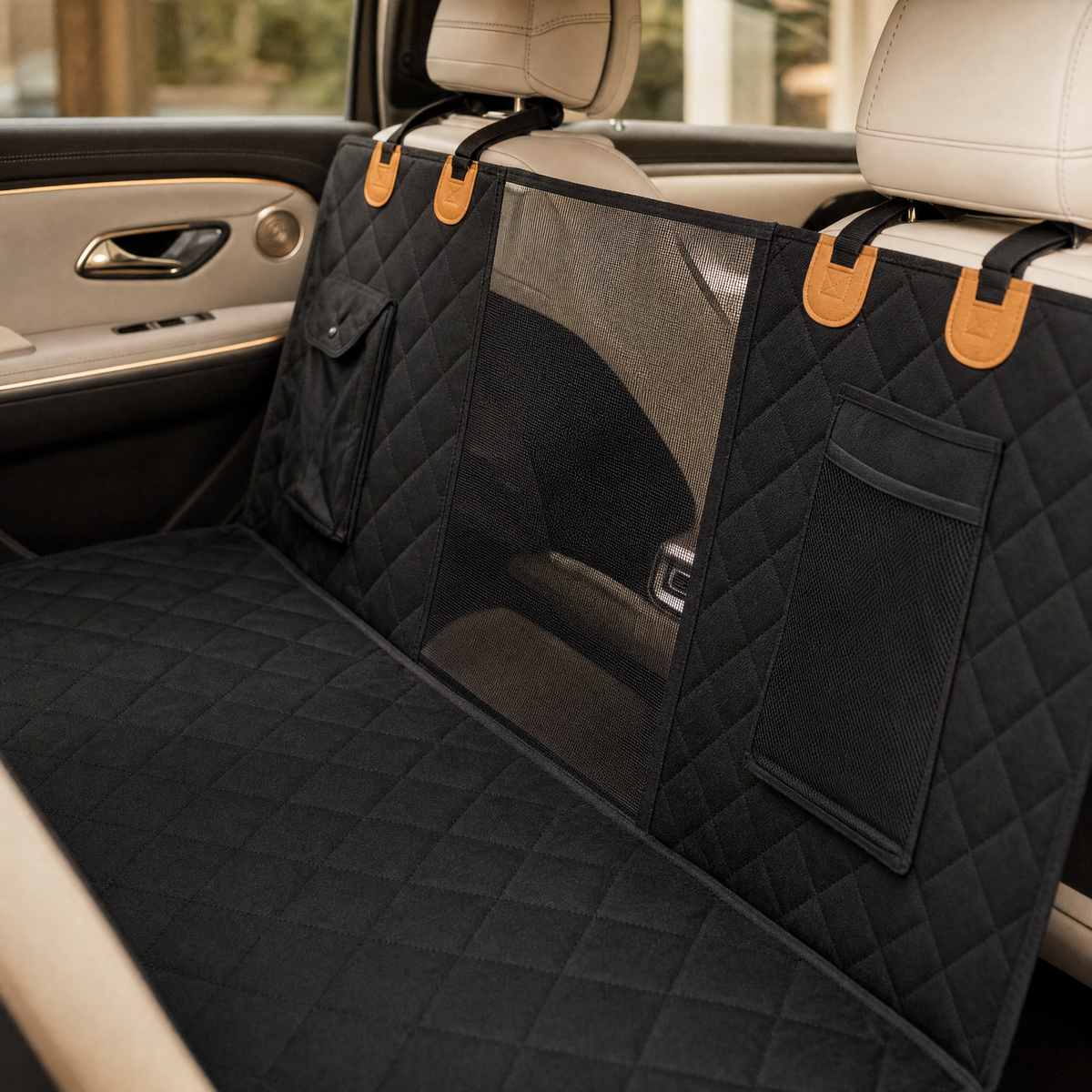 Front mesh window panel and mesh storage pocket detail on the dog car seat cover